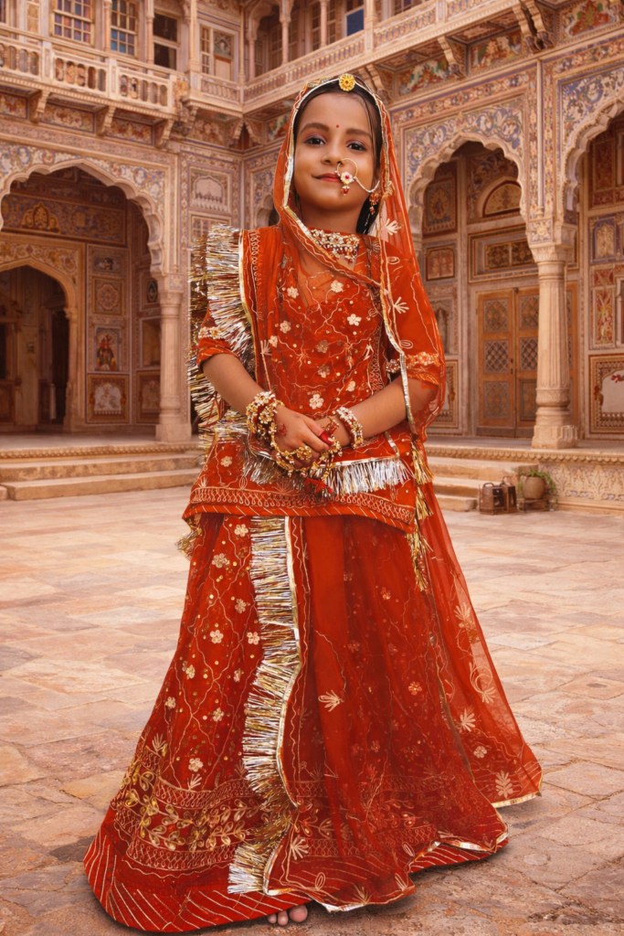 Girls Rajputi Poshak in Red Color with Zari-Stone Work